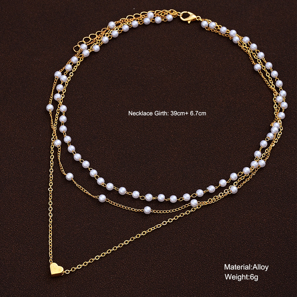 Damen mehrlagige Halskette mit Perlenschmuck und Herzanhänger Shop Nory