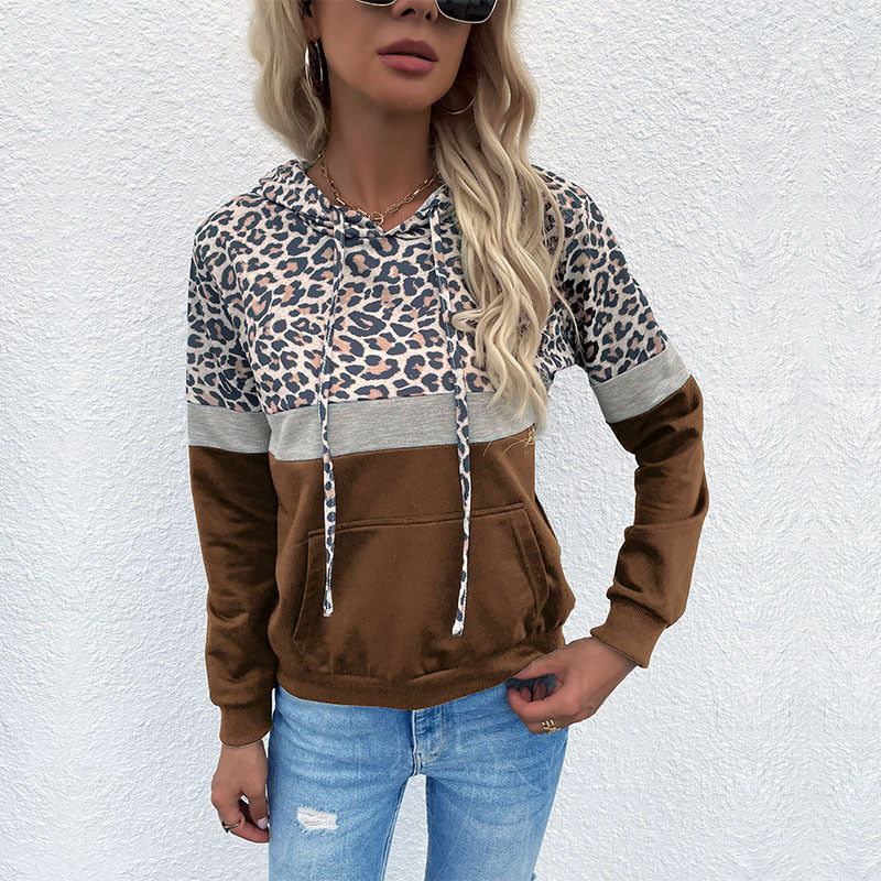 Damen Kapuzenpullover mit Leo-Print, Colorblock-Einsatz und Kängurutasche Shop Nory
