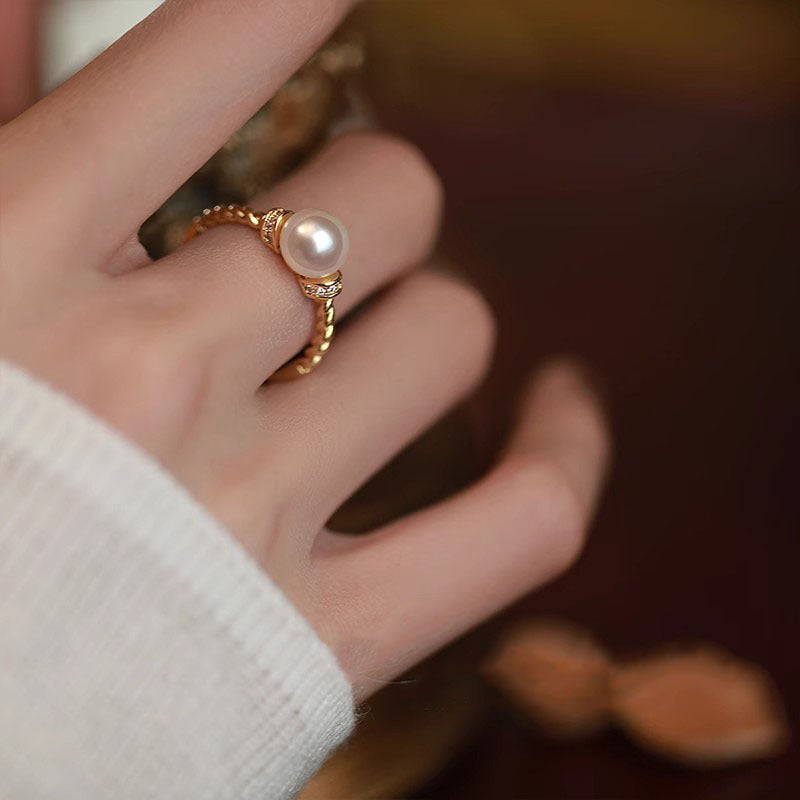 Damen eleganter Ring mit kunstvoll geflochtenem Design und edler Perle Shop Nory