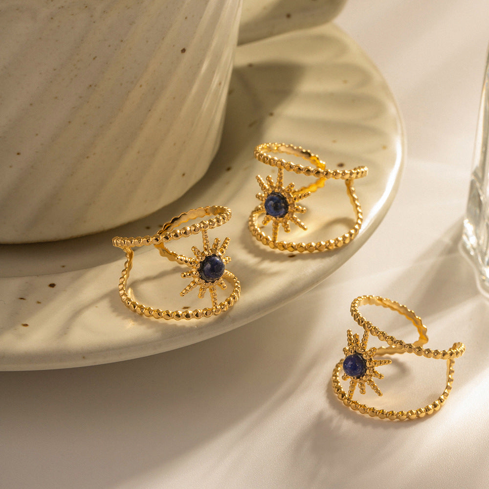 Damen Offener Ring mit filigranem Sonnenmotiv und hypnotisierenden Edelsteinen Shop Nory