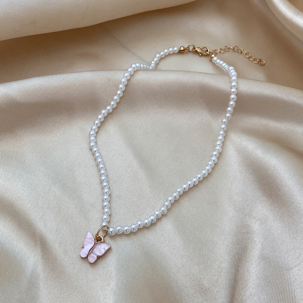 Damen Halskette mit elegantem Schmetterlingsanhänger aus Perlen Shop Nory
