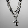Damen mehrlagige Kette mit funkelndem Kreuzanhänger und eleganten Gliederkettendetails Shop Nory