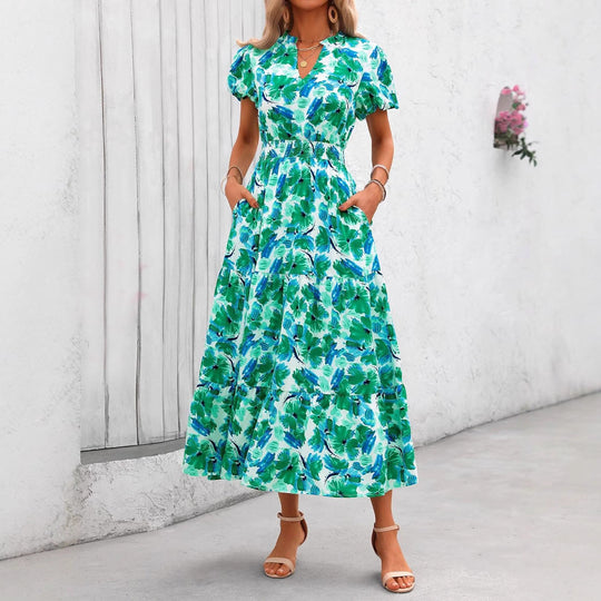Damen Maxi-Kleid mit floralen Mustern und rüschendem Saum Shopnory