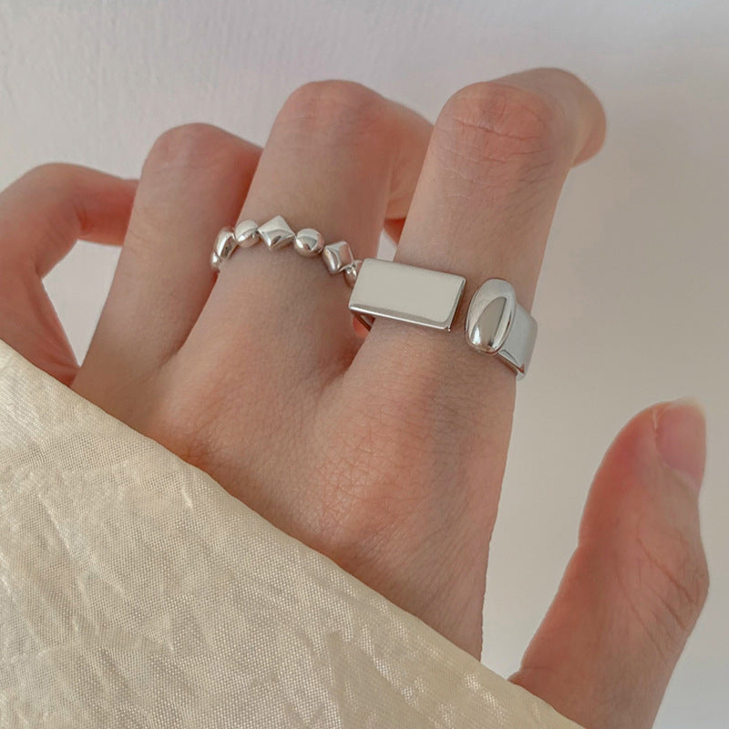 Damenring mit modernem geometrischen Design und filigranen Akzenten Shop Nory