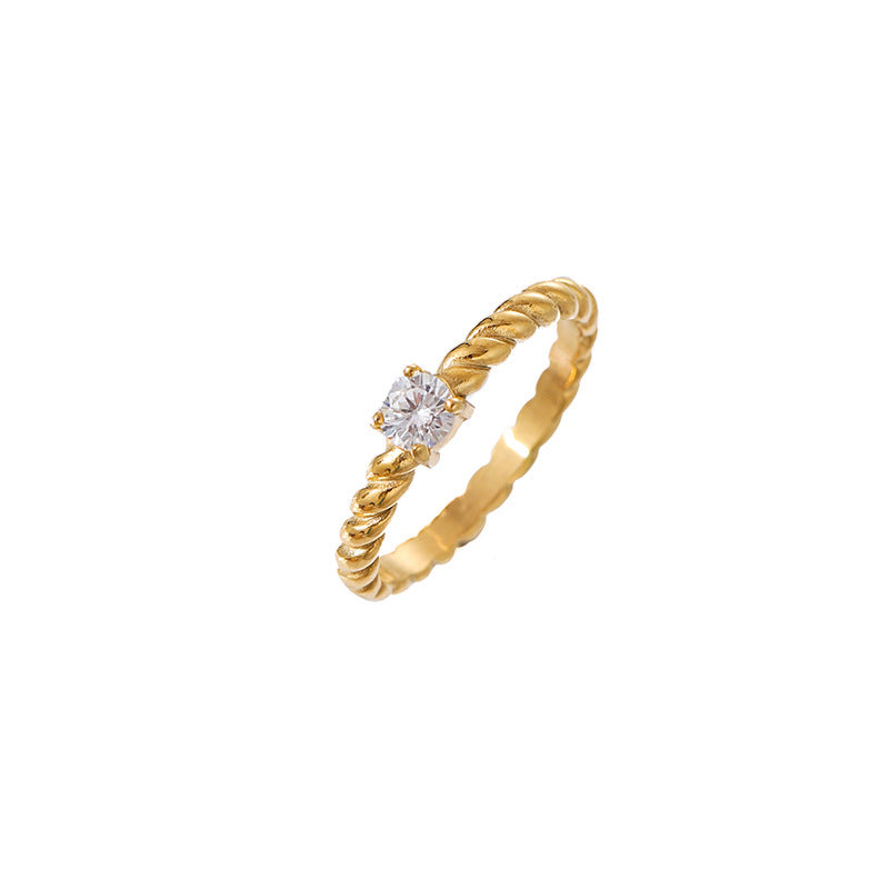 Damen eleganter Ring mit gedrehtem Design und funkelndem Stein Shop Nory