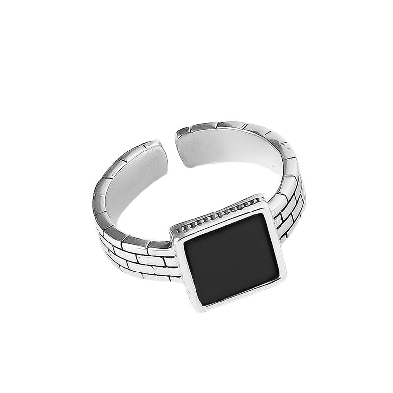Damenring mit kunstvollem Design und rundem Onyx Shop Nory