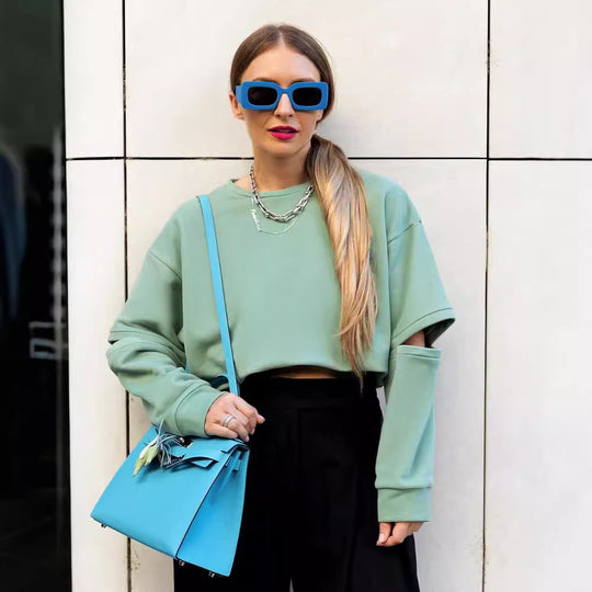 Damen Oversized Sweatshirt mit Layer-Ärmeln und seitlichem Schlitz Shop Nory
