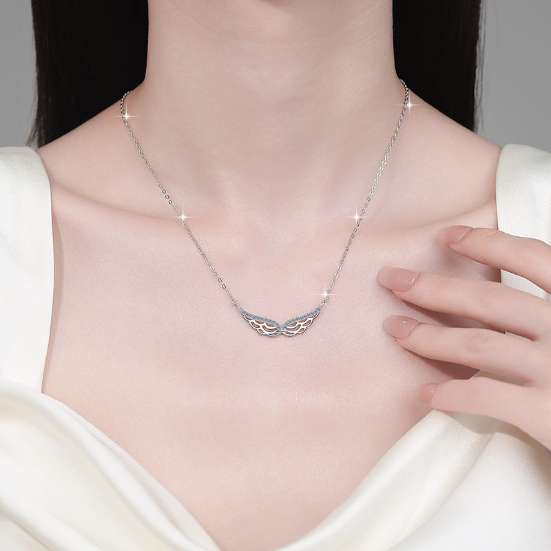 Damen Halskette mit elegantem Flügel-Design und Zirkonia-Besatz Shop Nory