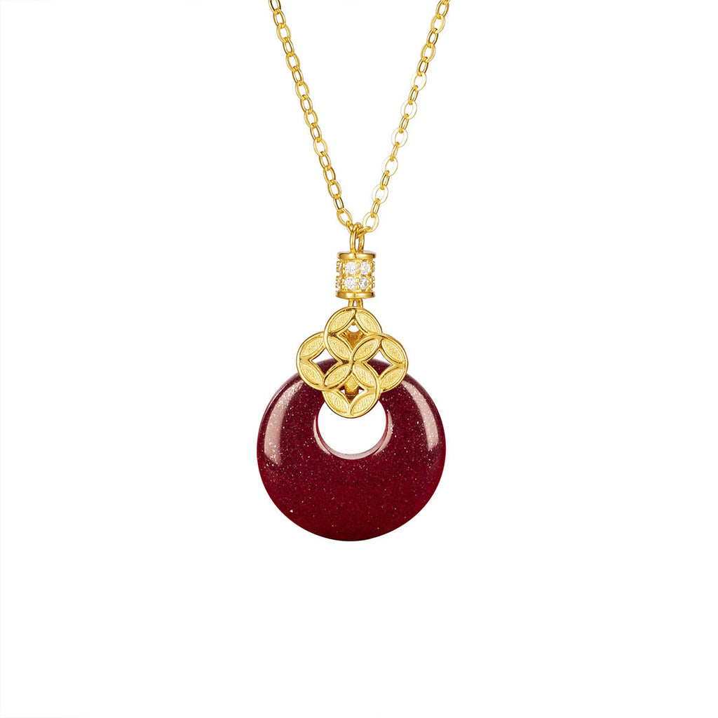 Damen Anhänger-Halskette mit funkelndem goldfarbenen Detail und rotem Edelstein Shop Nory