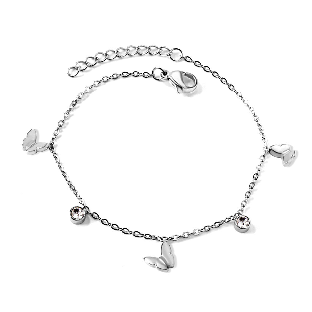 Damen Armband mit filigranen Blumenmotiven und funkelnden Kristallen Shop Nory