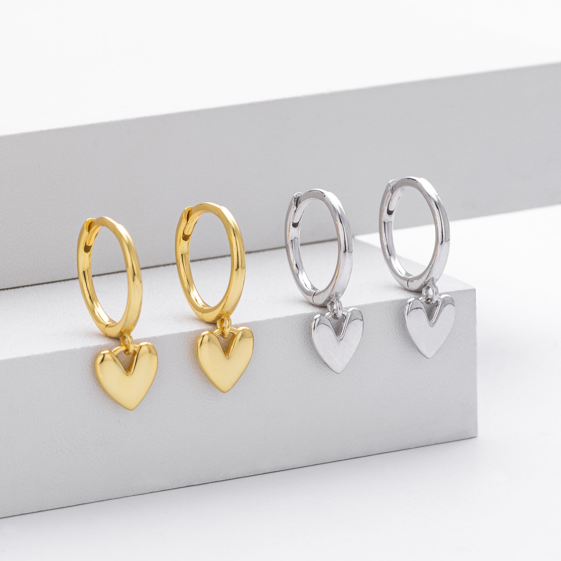 Damen Creolen mit herzförmigem Anhänger aus 925 Sterling Silber Shop Nory
