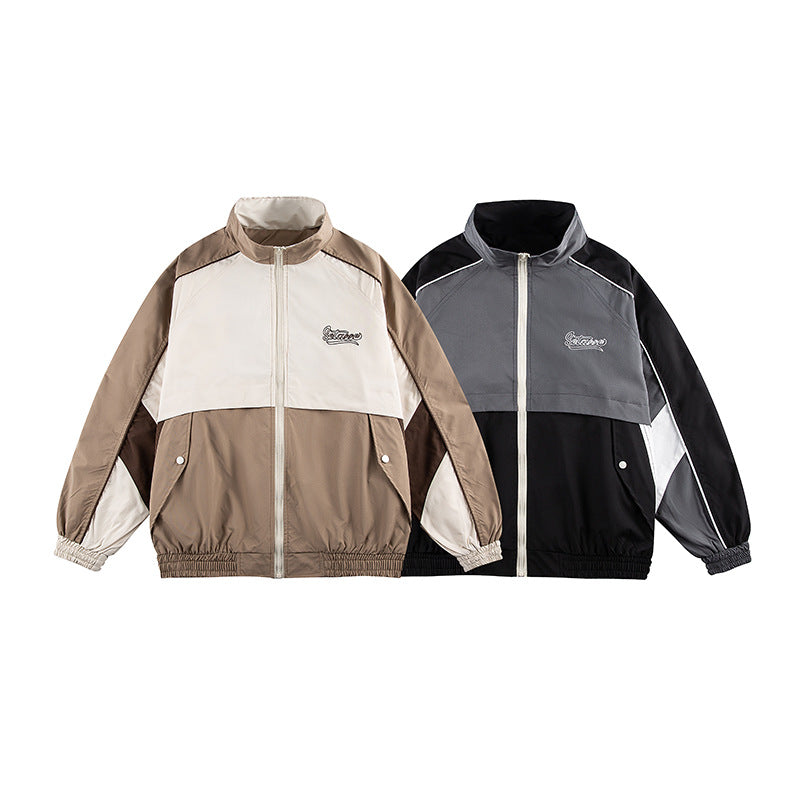 Unisex Kastig geschnittene Trackjacke im Retro-Sportstil mit hohem Stehkragen, Farbblock‑Einsätzen und elastischem Saum Shop Nory