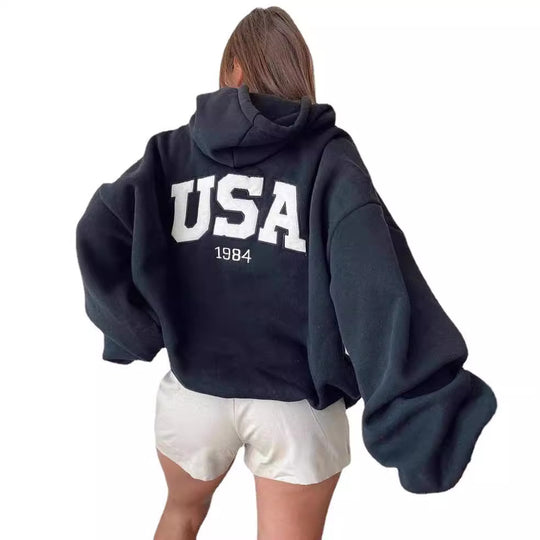 Damen Kurz geschnittener Oversize-Kapuzenpullover mit aufgenähter College-Applikation und gerippten Bündchen Shop Nory
