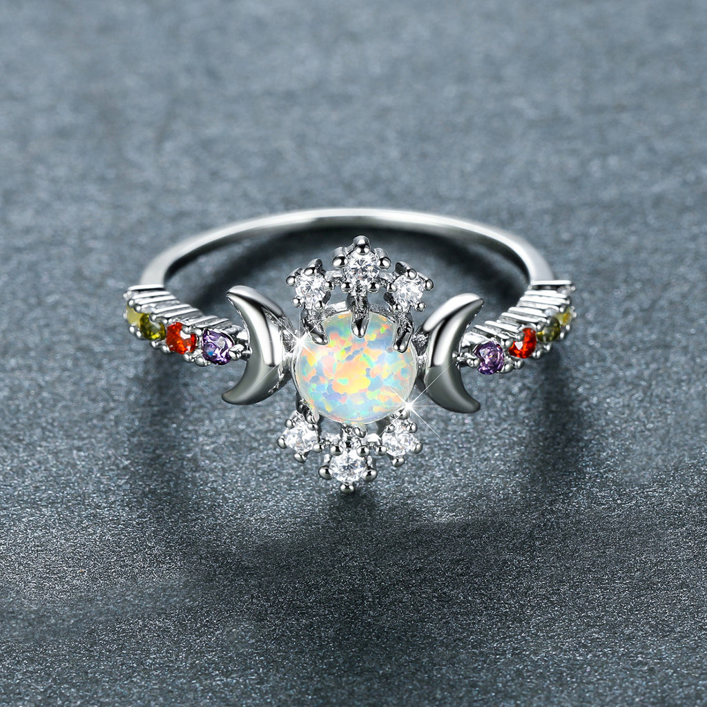 Damen Ring mit schimmerndem Opalsteinglanz und funkelnden Zirkonia-Elementen Shop Nory