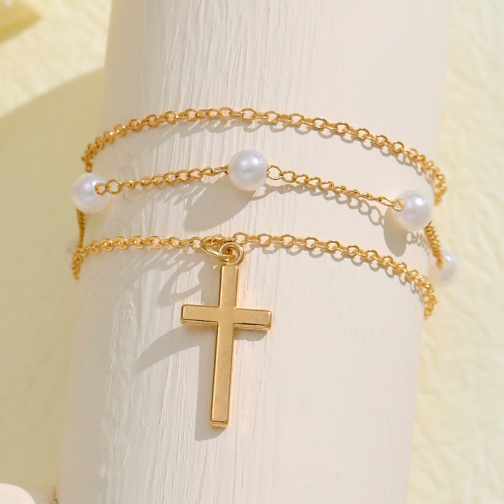 Damen Fußkettchen mit elegantem Perlendesign und subtilen Kreuzanhänger Shop Nory