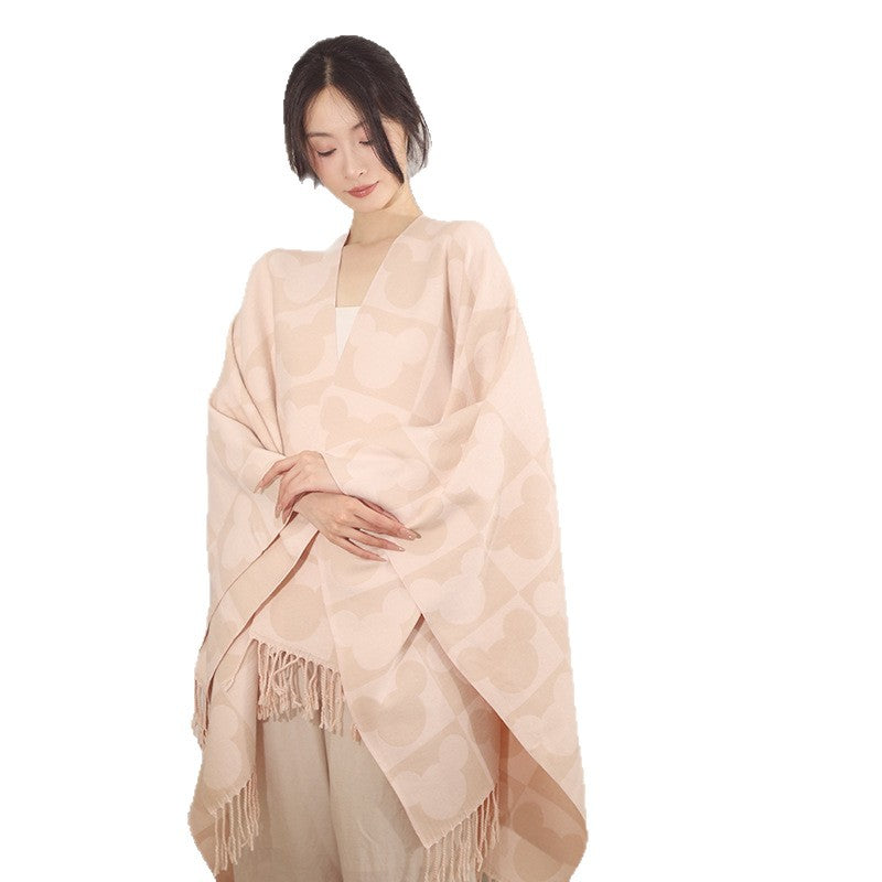 Damen Oversize-Jacquardponcho mit grafischem Kopf-Silhouettenmuster und Fransen Shop Nory