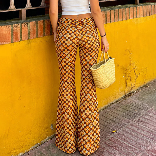 Damen nan ausgestellte Schlaghose mit hoher Taille, seitlichen Kordelzügen und retro Blumenprint Shop Nory