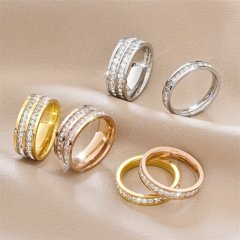 Damen Ring mit funkelnden, quadratischen Zirkonia-Steinen Shop Nory