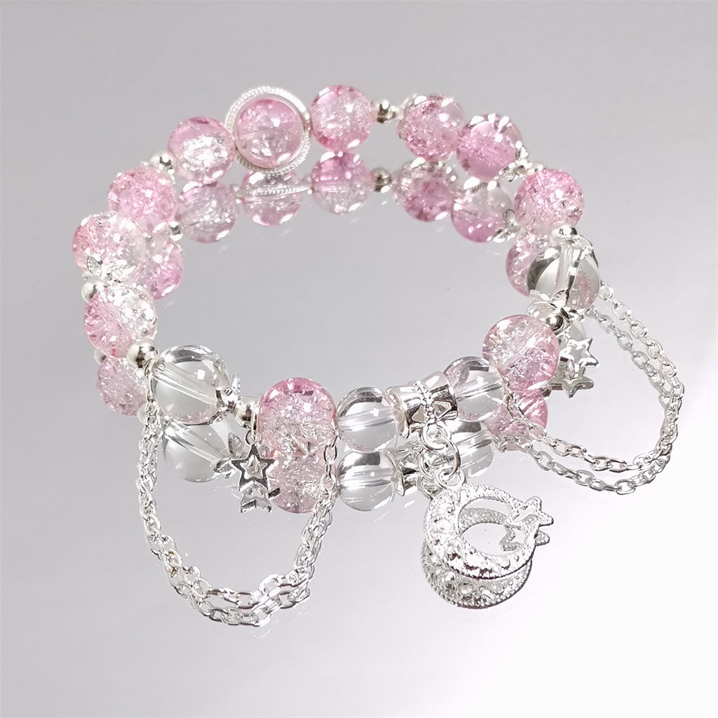 Damen Armband mit funkelnden Kristall-Elementen und charmanten Anhängern Shop Nory