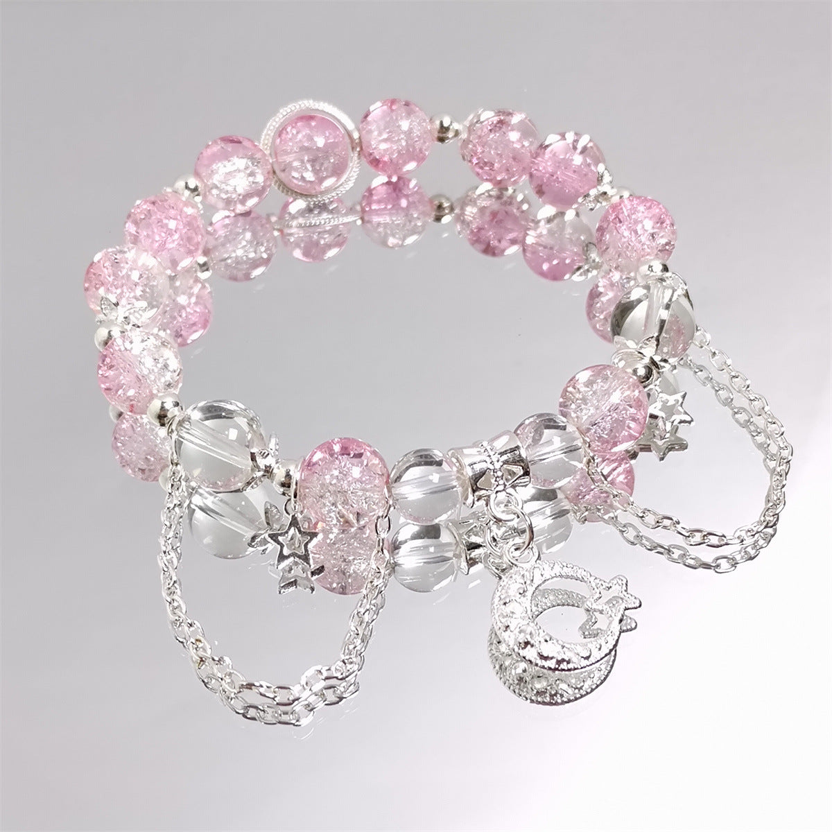 Damen Armband mit funkelnden Kristall-Elementen und charmanten Anhängern Shop Nory