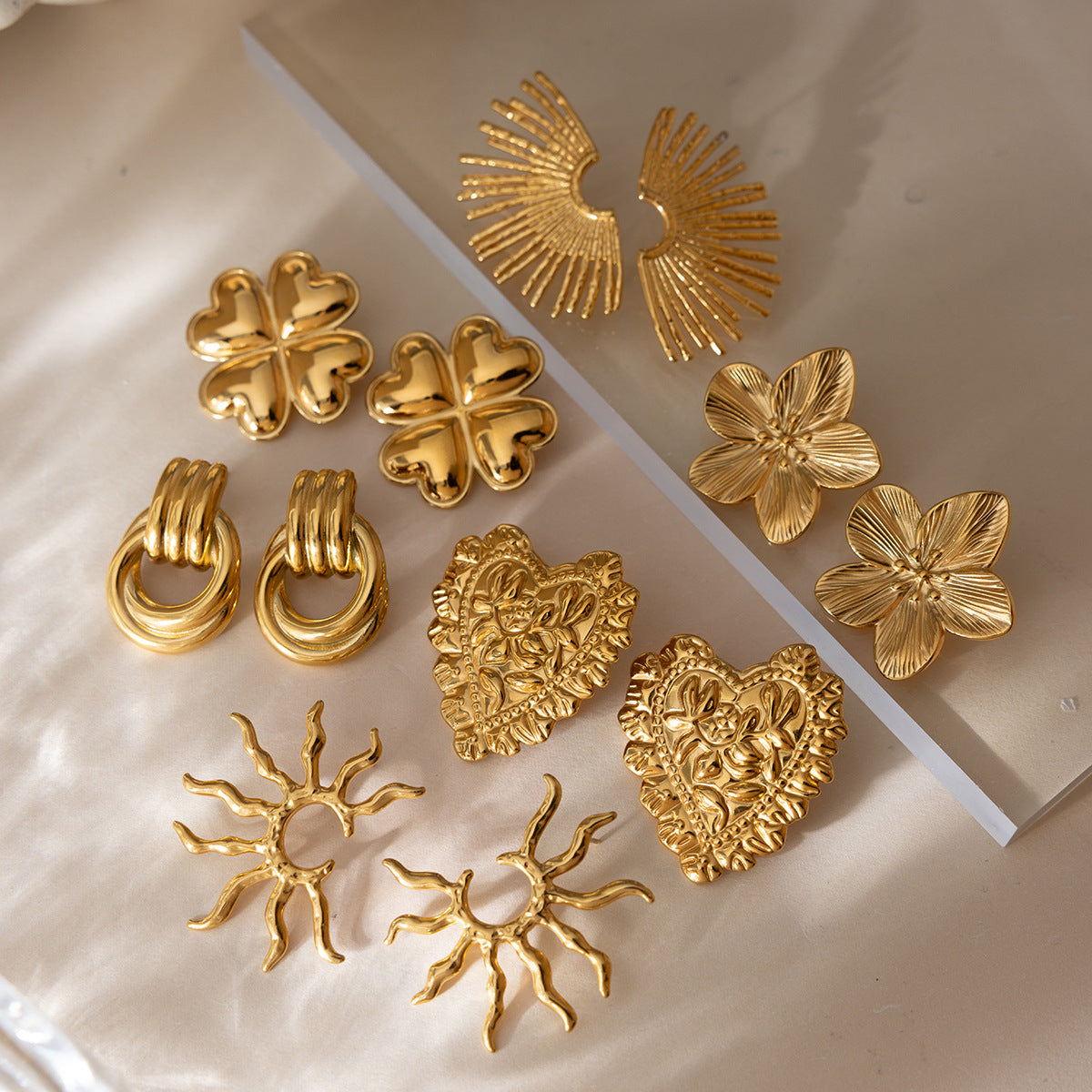 Damen Ohrhänger im Sonnen- und Herzdesign aus hochwertigem Edelstahl Shop Nory