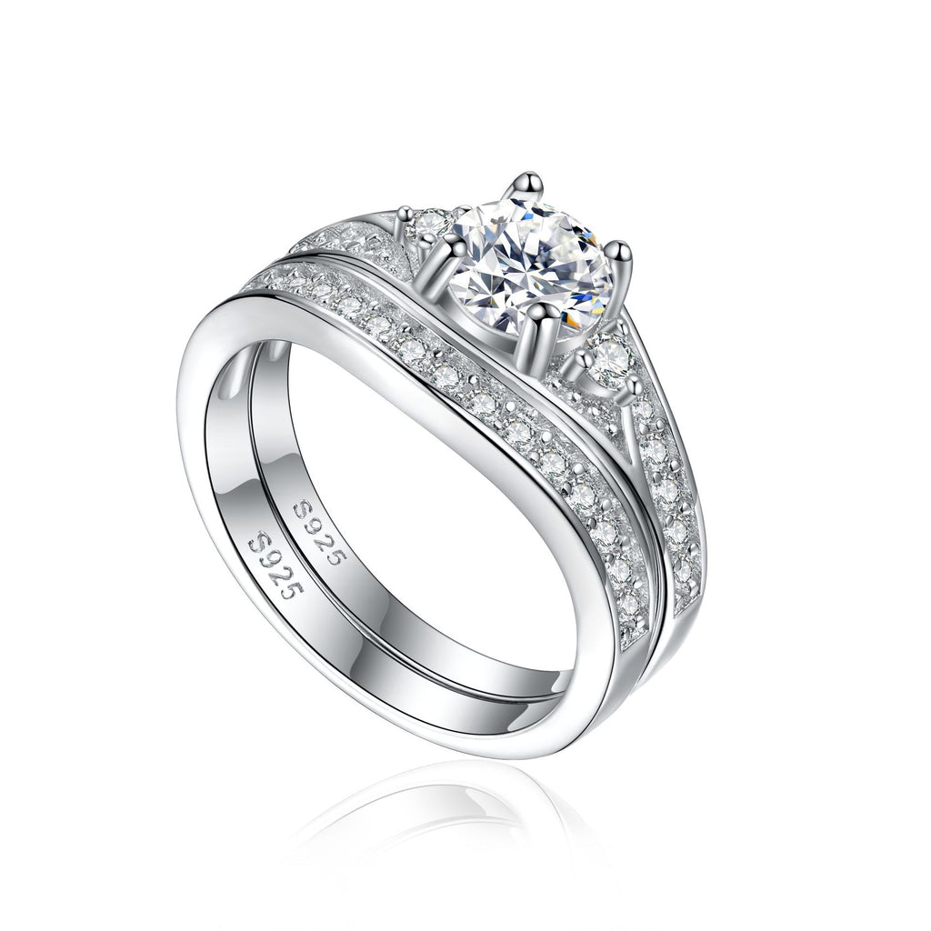 Damenring mit elegantem, geschwungenem Design und funkelndem Zirkonia-Besatz Shop Nory