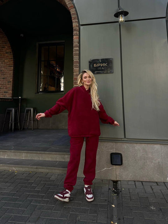 Damen kuscheliges Sweat-Set mit extralangem Kapuzenpullover, verdeckter Kängurutasche und schmal zulaufender Bündchenhose Shop Nory