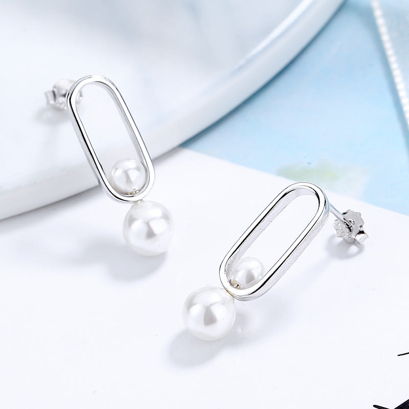 Damen Ohrstecker mit modernem ovalen Design und eleganten Perlen Shop Nory