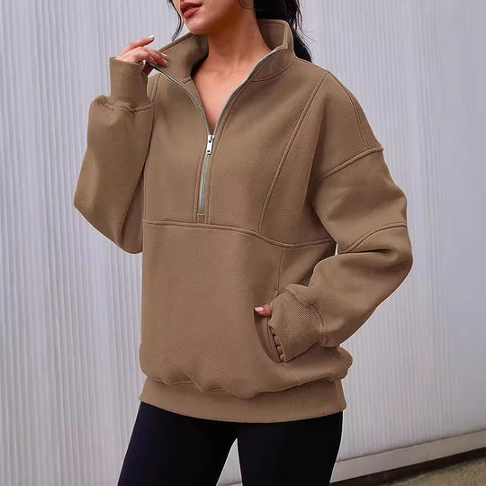 Damen Oversized Sweatshirt mit halbem Reißverschluss, Kängurutasche und Stehkragen Shop Nory
