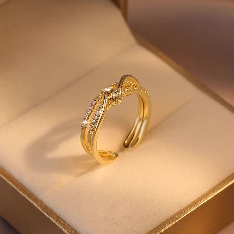 Damen Eleganter Knotenring mit funkelnden Zirkonia Shop Nory