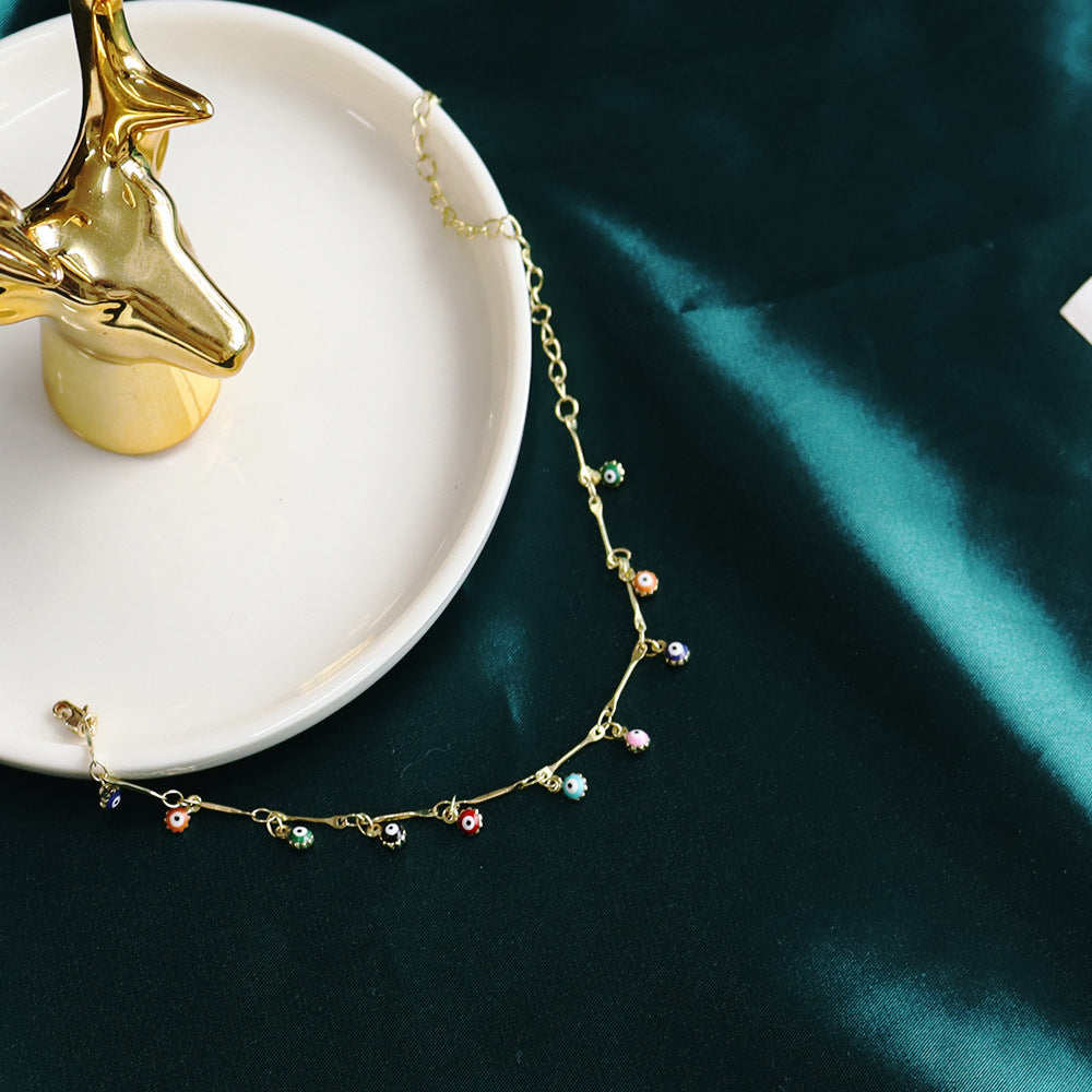 Damen Fußkettchen mit bunten Augen-Anhängern und eleganter Gliederkette Shop Nory