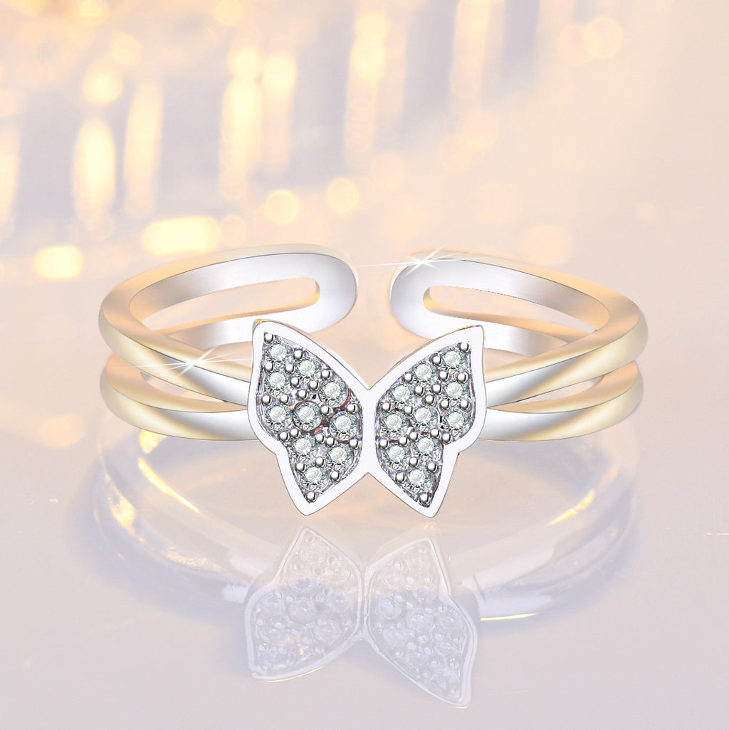 Damenring mit filigranem Schmetterlingsdesign und funkelnden Zirkonia Shop Nory
