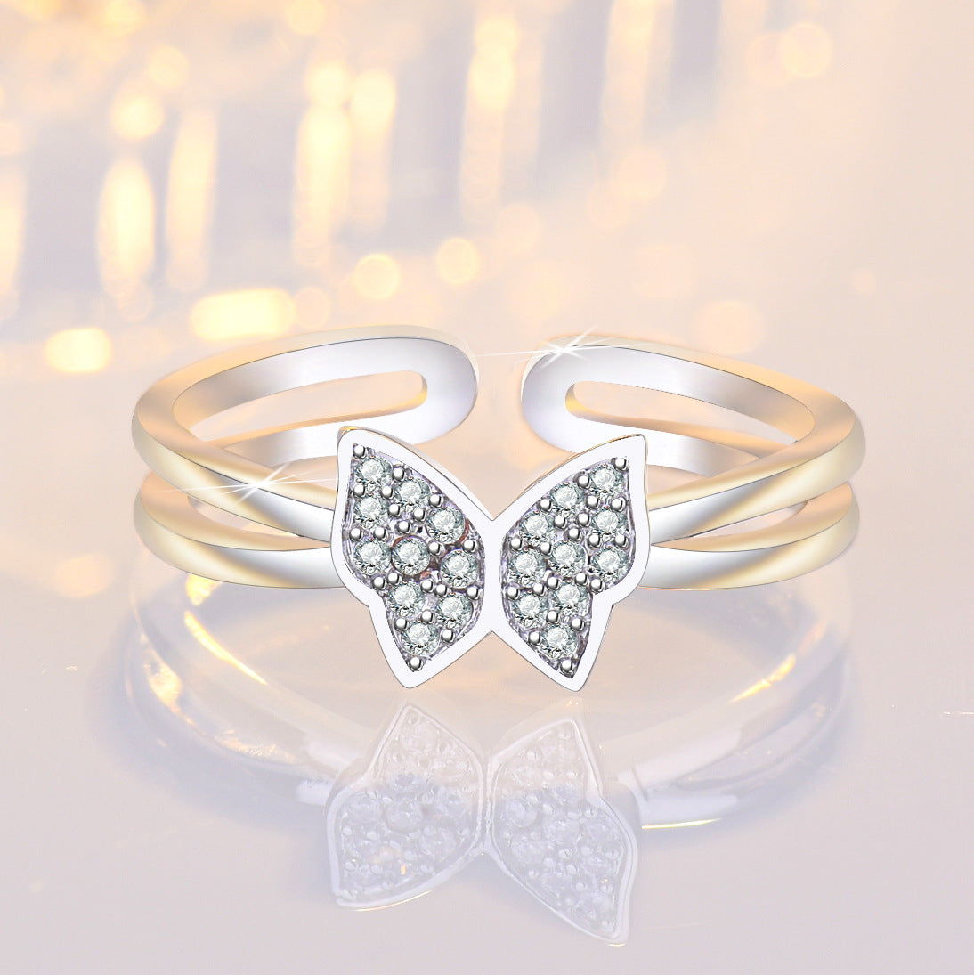 Damenring mit filigranem Schmetterlingsdesign und funkelnden Zirkonia Shop Nory