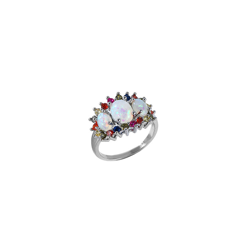 Damen eleganter Ring mit opalisierten Steinen und bunten Akzenten Shop Nory