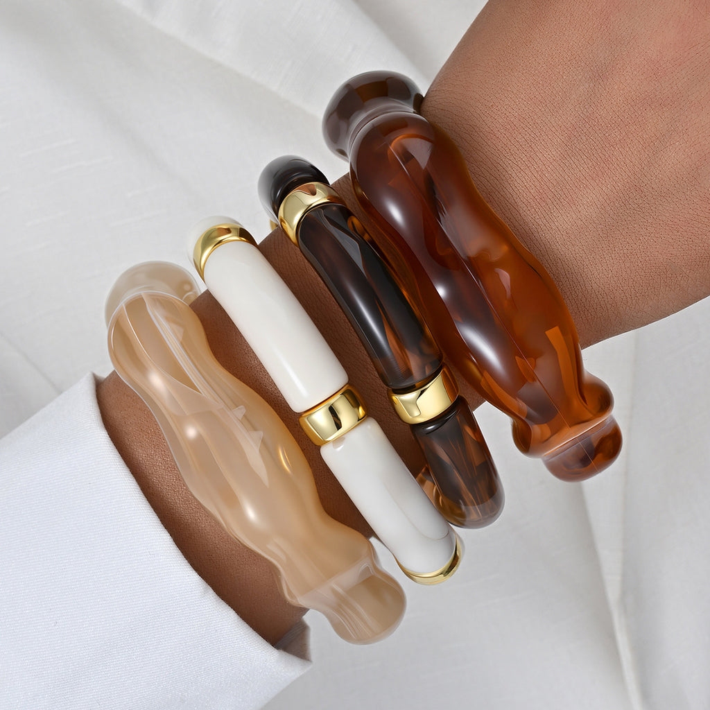 Damenarmreif mit geschwungenem Design und glänzender Oberfläche Shop Nory