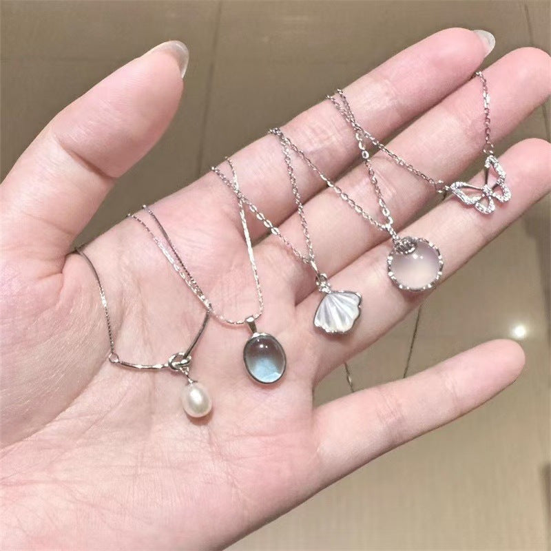 Damen Halskette mit muschelförmigem Anhänger Shop Nory