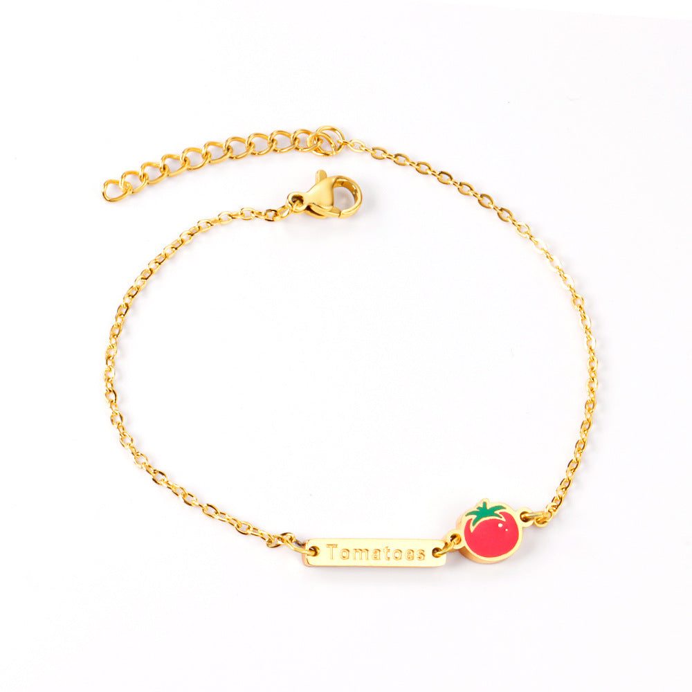 Damen Armband mit verspieltem Hotdog-Anhänger und goldfarbener Kettenstruktur Shop Nory