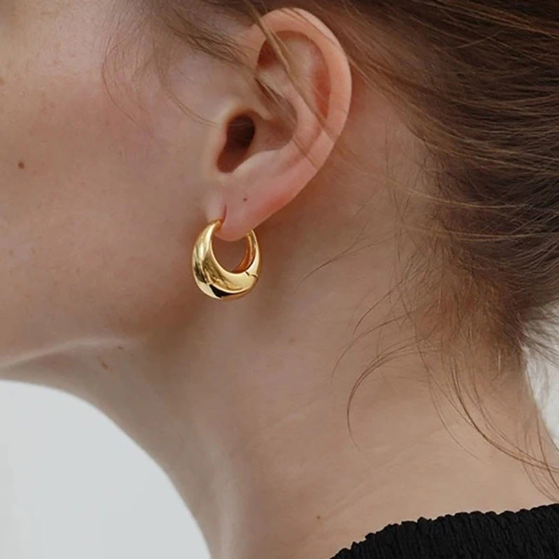 Damen Ohrringe mit modernem, geschwungenem Design Shop Nory