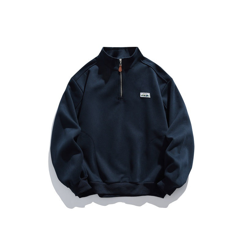 Unisex Halbzip-Sweatshirt mit Stehkragen, Raglanärmeln und minimalistischer Brustpatch Shop Nory