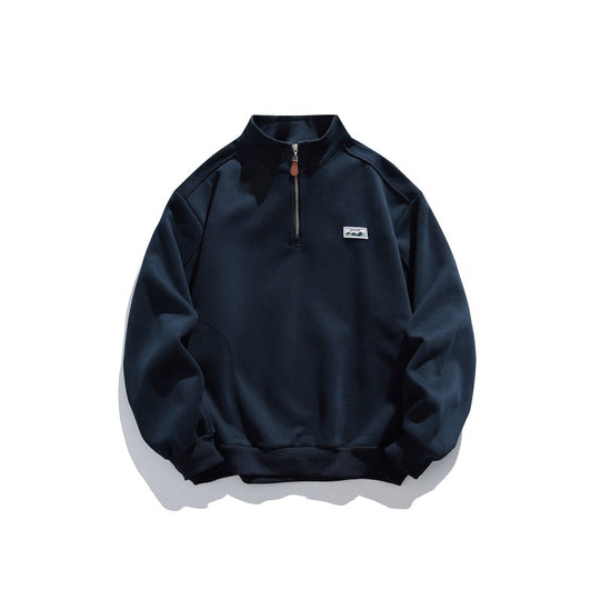 Unisex Halbzip-Sweatshirt mit Stehkragen, Raglanärmeln und minimalistischer Brustpatch Shop Nory