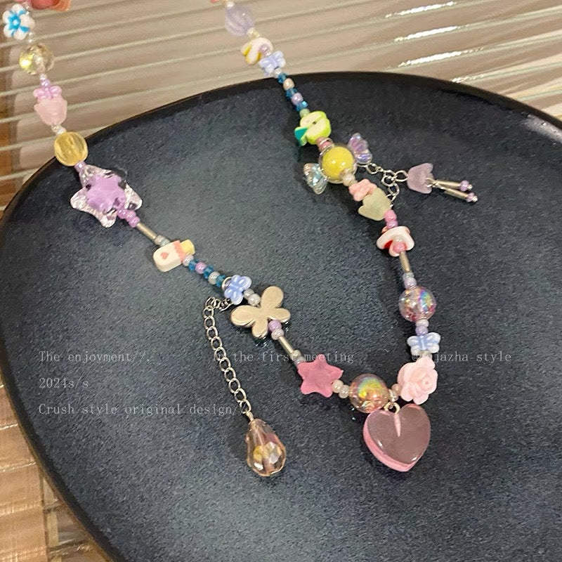 Damen Kette mit bunten Anhängern und handgefertigten Details Shop Nory