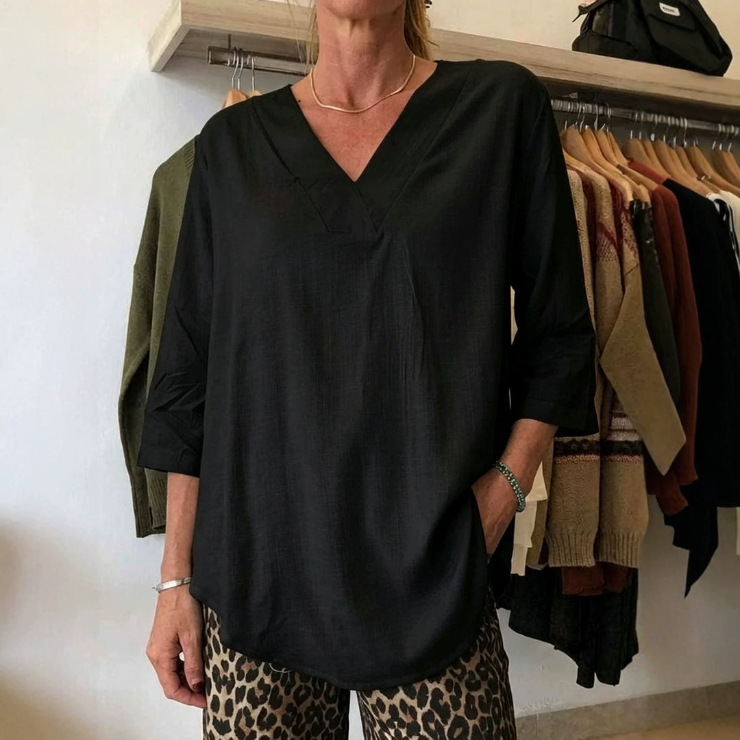 Damen Leichte Oversize V-Ausschnitt Tunika in Leinenoptik mit dreiviertel Ärmeln und abgerundetem Saum Shop Nory