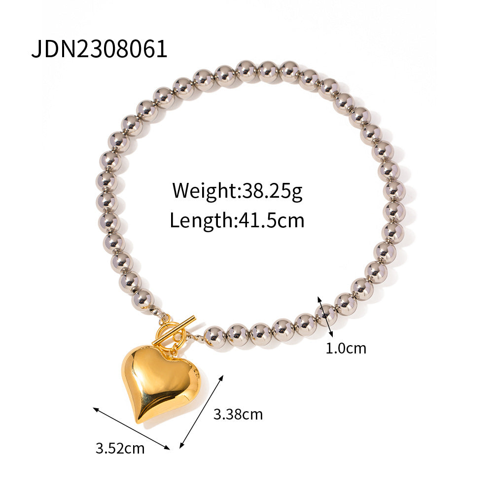 Damen Armband mit eleganten Perlen und herzförmigem Anhänger Shop Nory