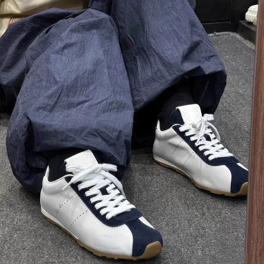 Damen Sneakers im eleganten Retro-Design mit atmungsaktiver Oberflächenstruktur