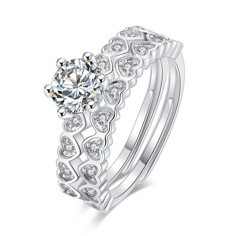 Damen Offener Ring mit kunstvollem geschwungenem Design und roségoldenen Akzenten Shop Nory