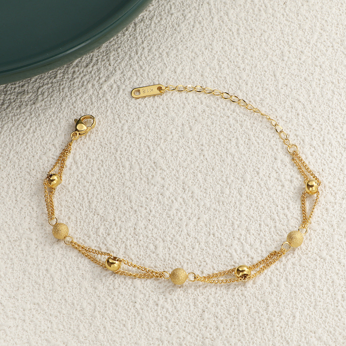 Damen filigrane Armkette mit glitzernden Perlen und robuster Kettengestaltung Shop Nory