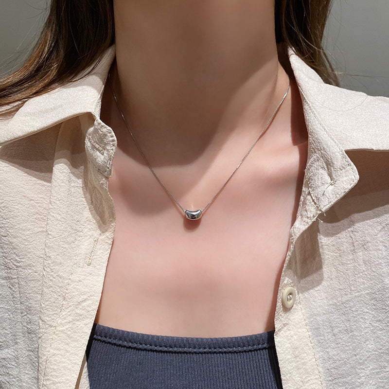 Damen Halskette mit modernem Bohnenanhänger aus hochwertigem Edelstahl Shop Nory