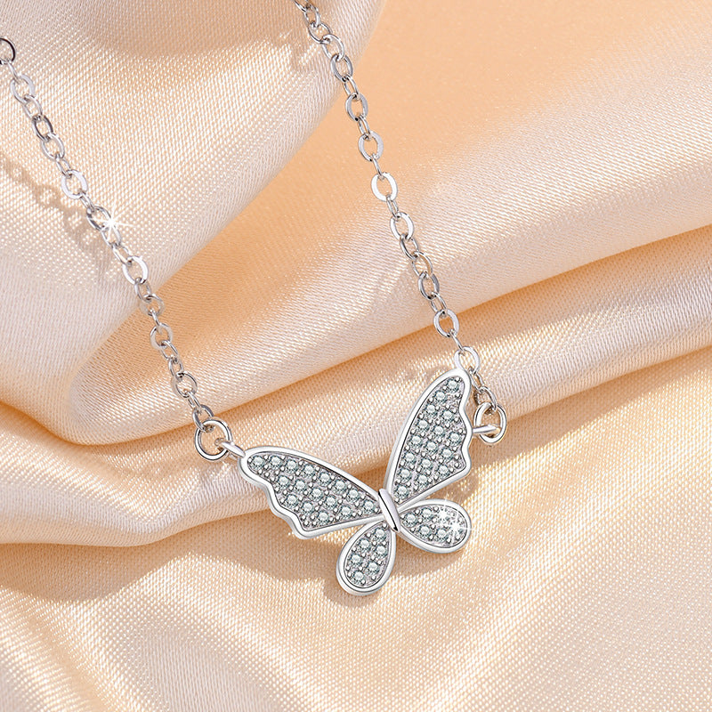Damen Halskette mit filigranem Schmetterlingsanhänger und funkelnden Zirkonia Shop Nory