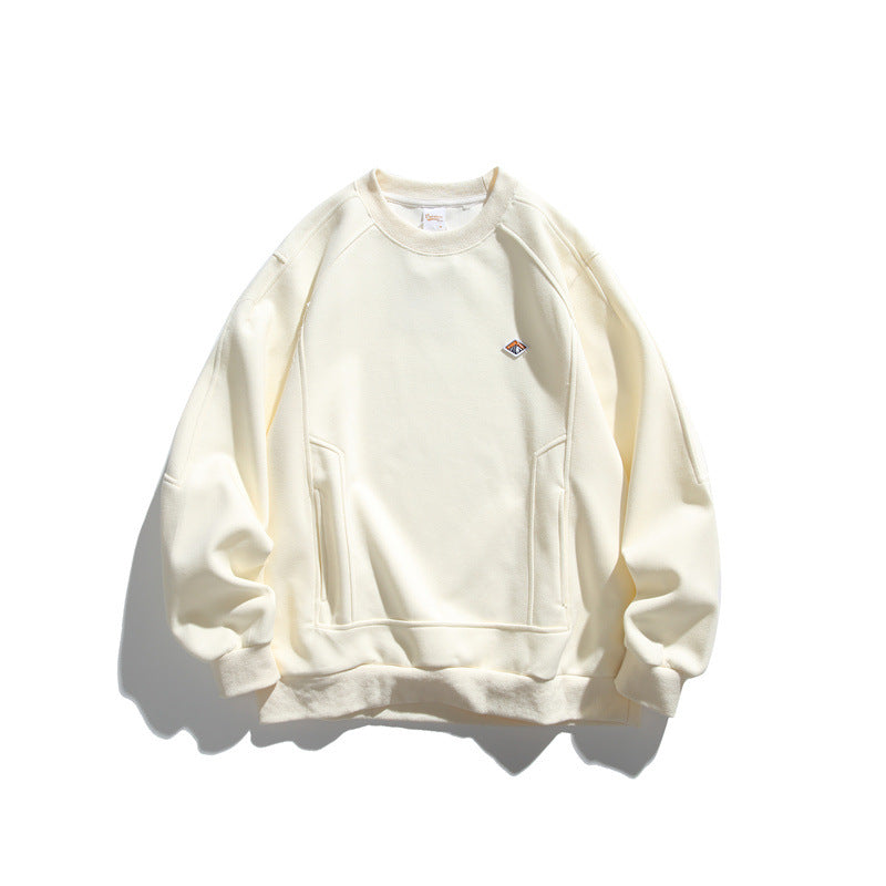 Unisex Oversize-Sweatshirt aus French-Terry mit Raglanärmeln, verdeckten Eingrifftaschen und kleinem Logopatch Shop Nory