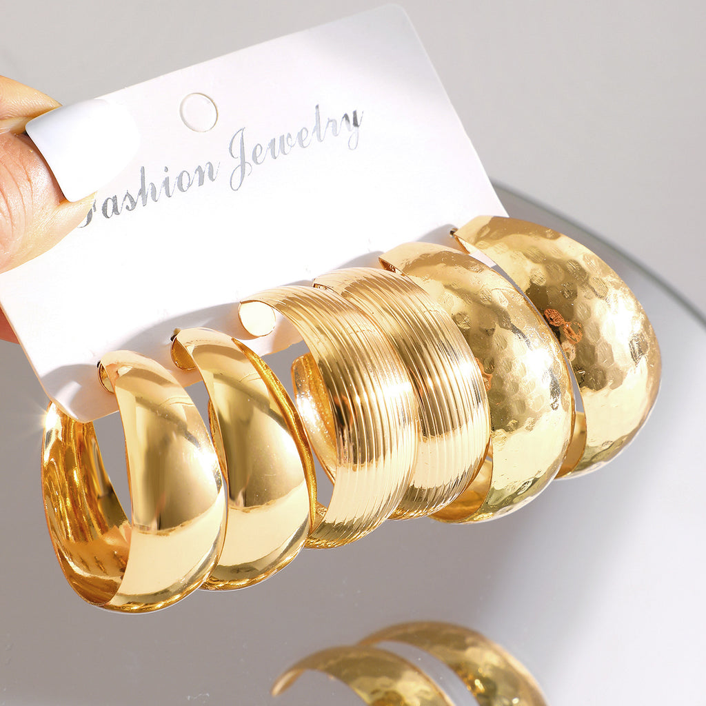 Damen Creolen Ohrringe Set aus hochwertiger, glänzender Metalloberfläche Shop Nory
